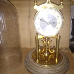 Old All Brass 400 Day Aniversary Clock.