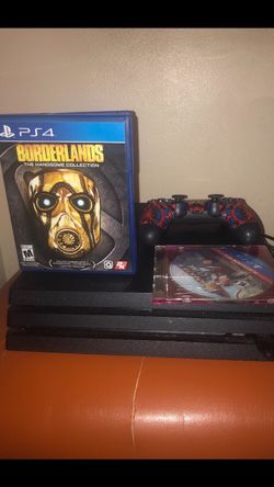 1 TB PlayStation 4 pro with 2 game one remote ratchet and clank game