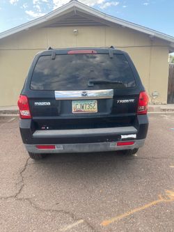 2008 black Mazda Tribute Mechanic Special