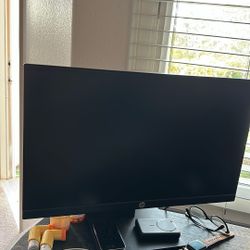 2 HP 27 Inch Monitors. 