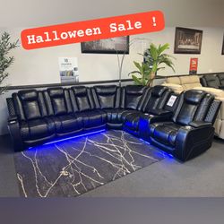 Black power reclining sectional sofa with led light