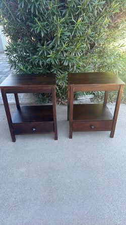 Two small wooden end tables