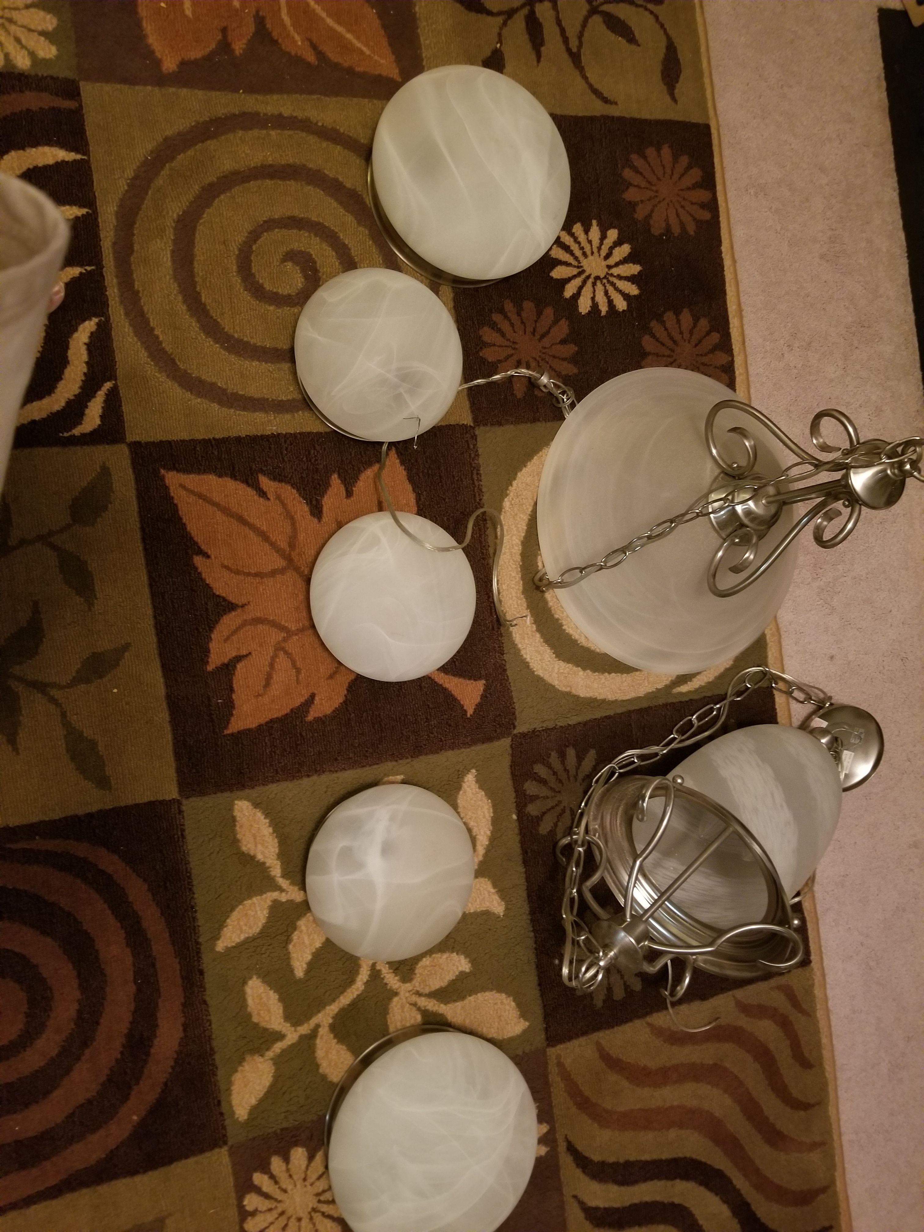 7 total Light fixtures.(2) hanging & the other 5 include 2 large and 3 smaller ones. Price negotiable.