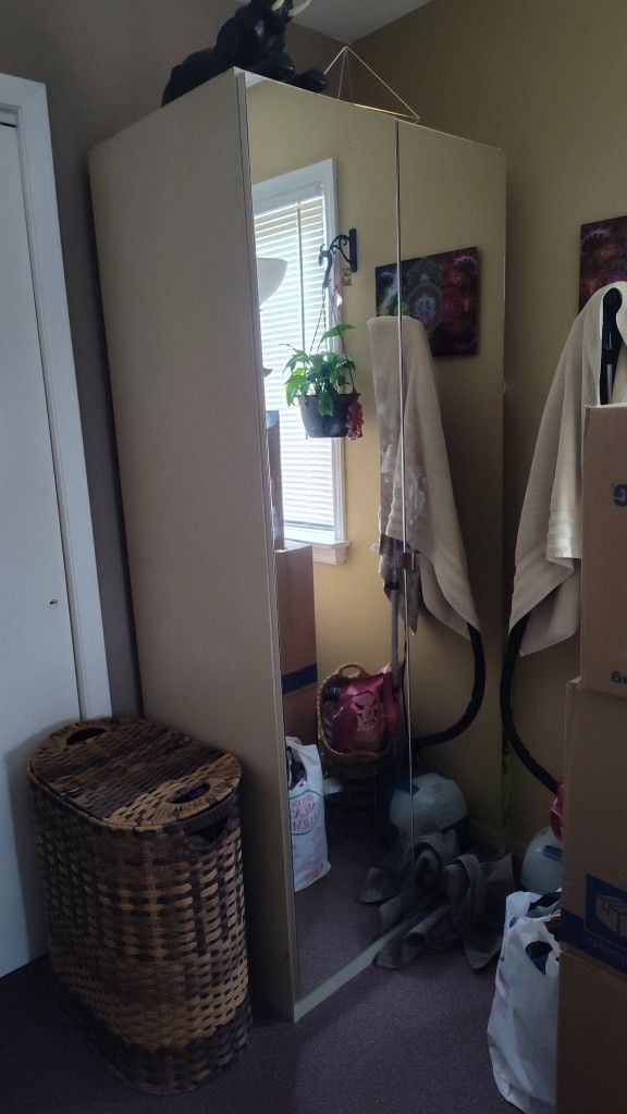 Tall Dresser w/ Mirrored Doors