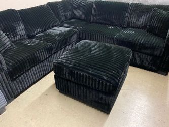 Black Plush Corduroy Sectional with ottoman and accent pillows 99x99
