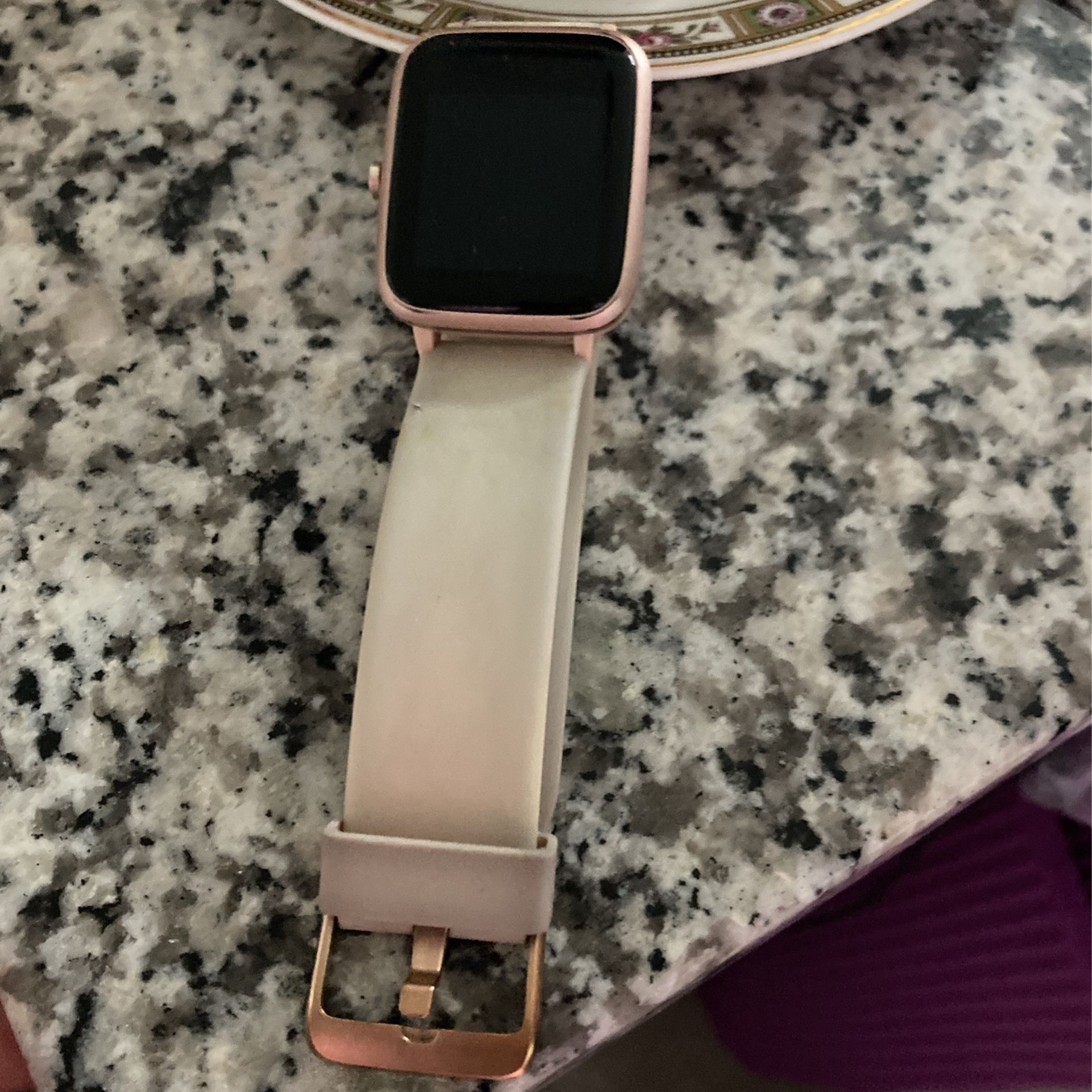 Rose Gold Fitbit Smart Watch