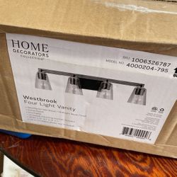 Home Decorators Collection Westbrook 30.5 in. 4-Light Weathered Oak Rustic Farmhouse Bathroom Vanity Light with Matte Black Accents