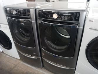 Maytag gray front load washer and gas dryer set on pedestals - Free delivery