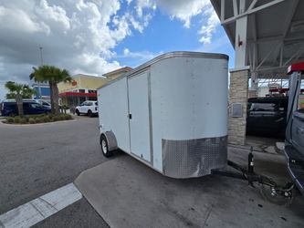 Trailer 6x14 "2015" used, but in excellent condition, pulls amazing no leaks 6ft hight interior clean documentation in hand ✋️ READ Description FIRST,