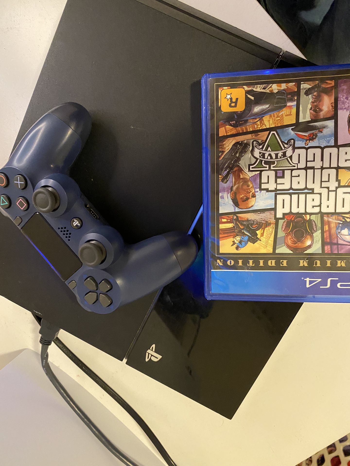 PS4 With Game,controller,HDMI Cord. (price Negotiable)