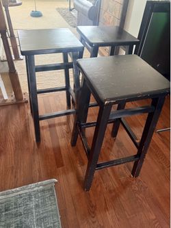 4 wooden bar stools