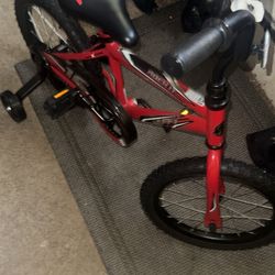 Kids brand new rock it bike with training wheels