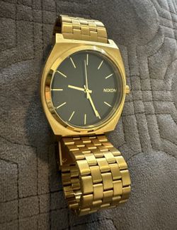 Nixon Time Teller A045. 100m Water Resistant Watch (37mm Stainless Steel Watch Face)