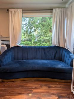 Dark blue with gold trim couch