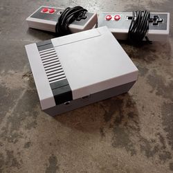 Nes, Atari, and Sega Genesis mini consoles