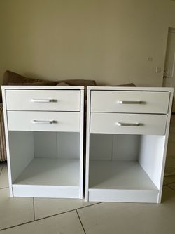 white nightstand with outlets