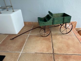Wagon Wood planter…(RUST ON WHEELS, SEE ALL PICTURES)…47” L by 15” W by 15” H…$25