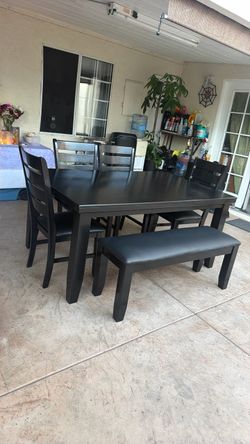 Black Dining table and 4 Chairs one bench