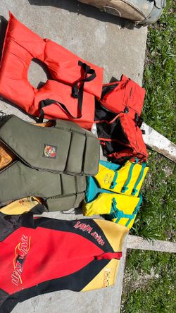 stearns life vest and other life jackets and wetsuit