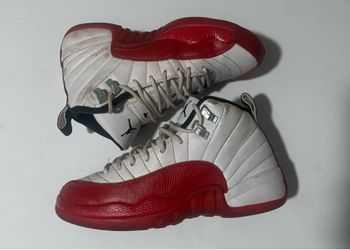 The Nike Air Jordan 12 Retro GS Youth Size 4.5 in Cherry Red/White beaters shoes are dirty and scuffed good beater or restoration project is a stylish
