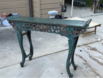 Ornately Carved Turquoise Console Table – $100