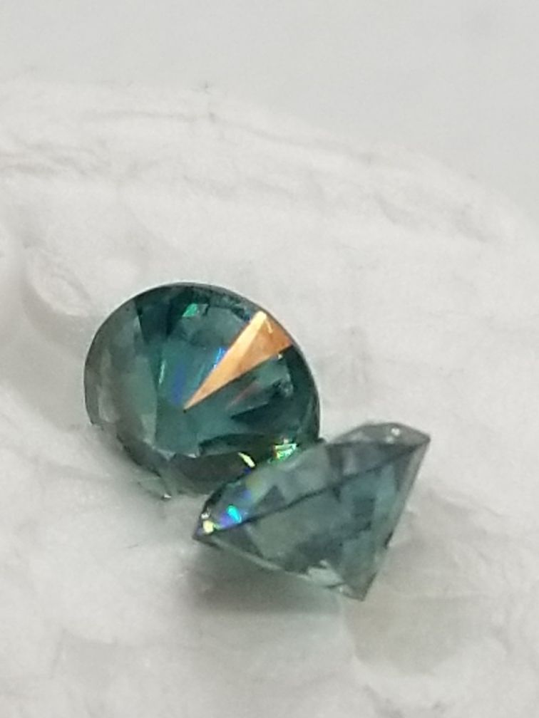 TEST AS DIAMOND...VVS CLARITY...2 STONES... DEEP BLUE. EXCELLENT CUT...JEWELRY MAKING!