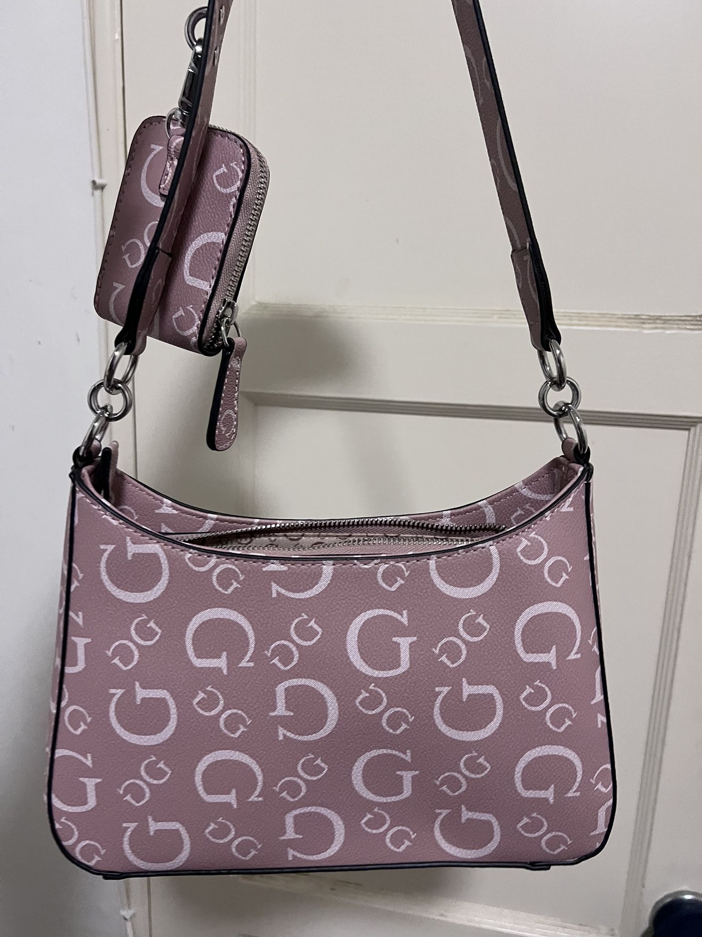 Pink Guess shoulder bag with pouch 