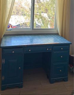 Spacious solid teal desk