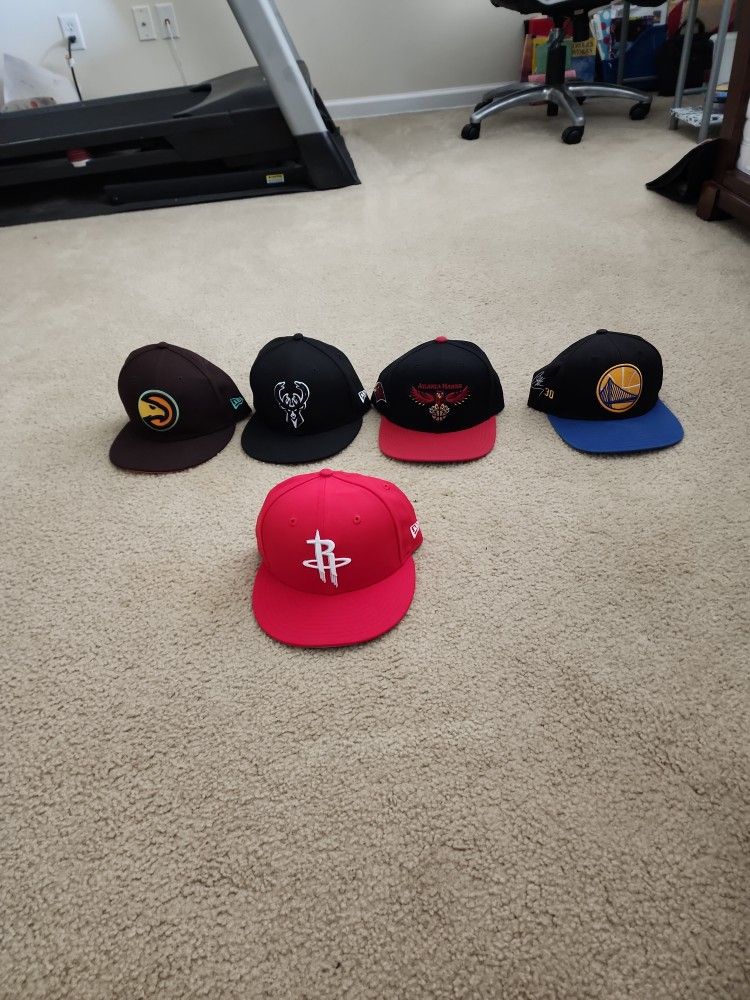 Assorted NBA hats