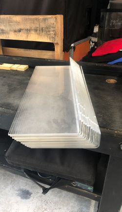 Container Store lucite shelf’s