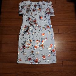 Vestido Blanco Con flores. T =12