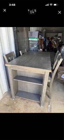 Table and 4 chairs cost $550