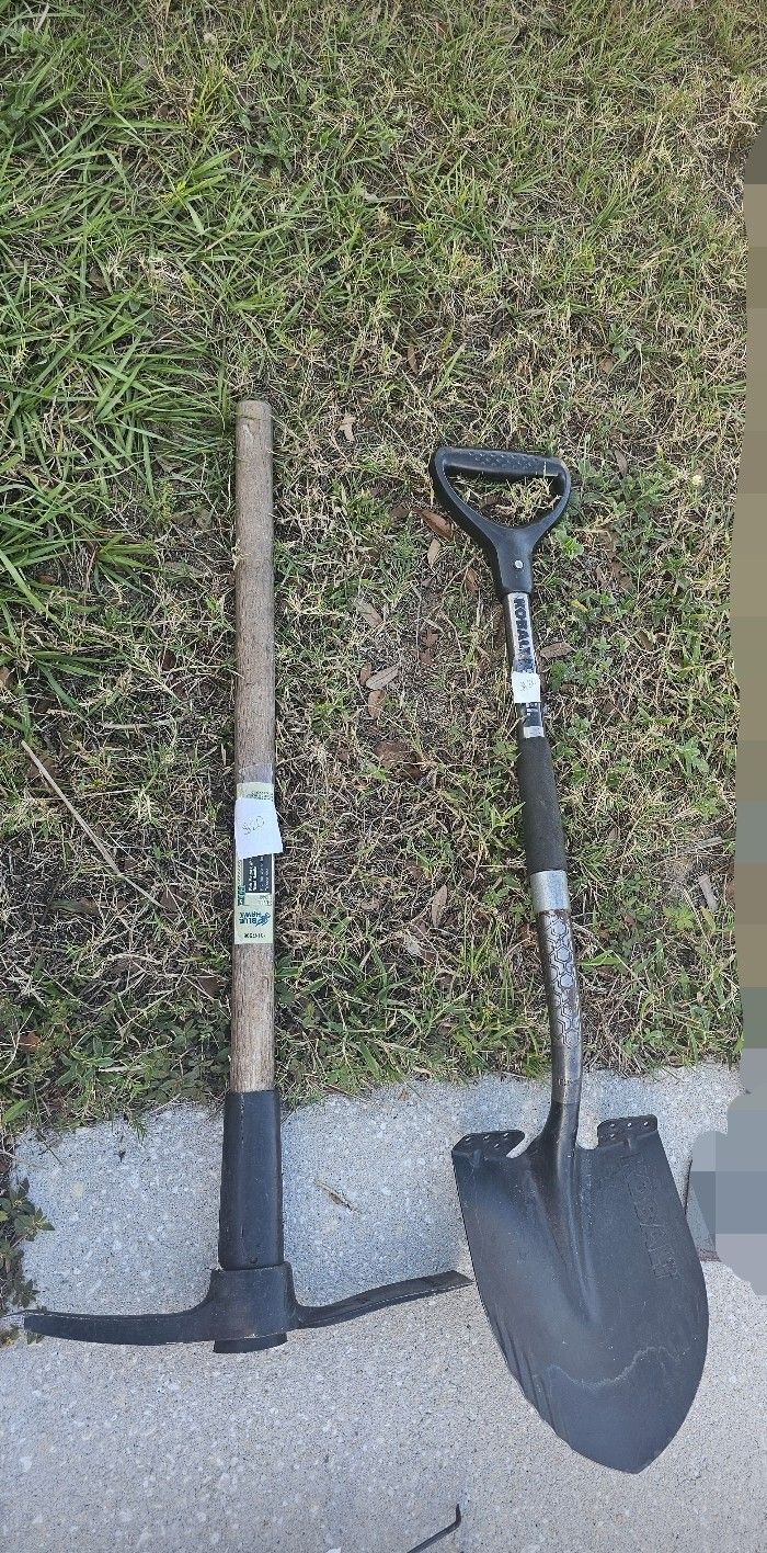 Gardening tools : shovel , Sprinkler, and small hand rakes