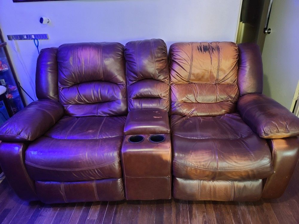 Leather electric dual recliner with cup holders and middle console