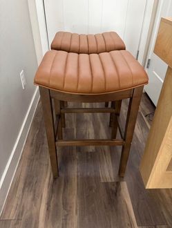 Brown leather stools