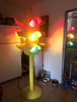 Original working antique street light mounted on stand 8’ x 27”