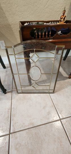 Antique etched glass and brass window.