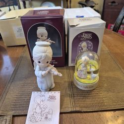Two precious moments, figurines new in original boxes