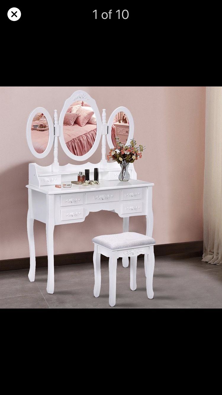 Make up vanity with five drawers and three mirrors