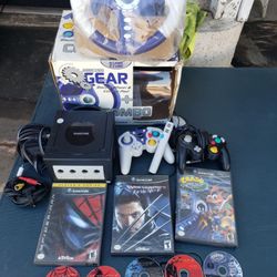 Nintendo GameCube with 5 Adult Kids Games. 2 Controllers. 1 Mic. 1 Racing Kitt game cube Console. $300! Lowest I accept Cash & trade. Free Delivery in