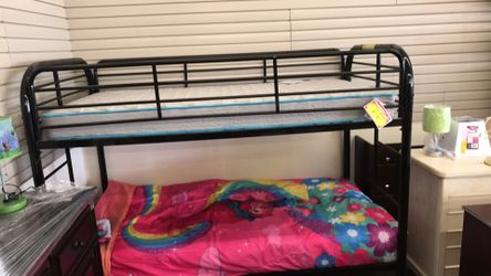 Twin over twin bunk bed ( mattress included)