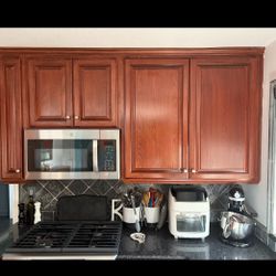 Kitchen Cherry wood upper cabinets