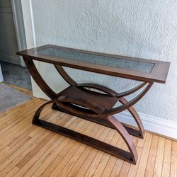 Modern Glass-Top Console Table – Sculptural Wood Base