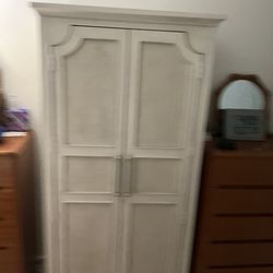 Wood Armoire in Antique White Finish