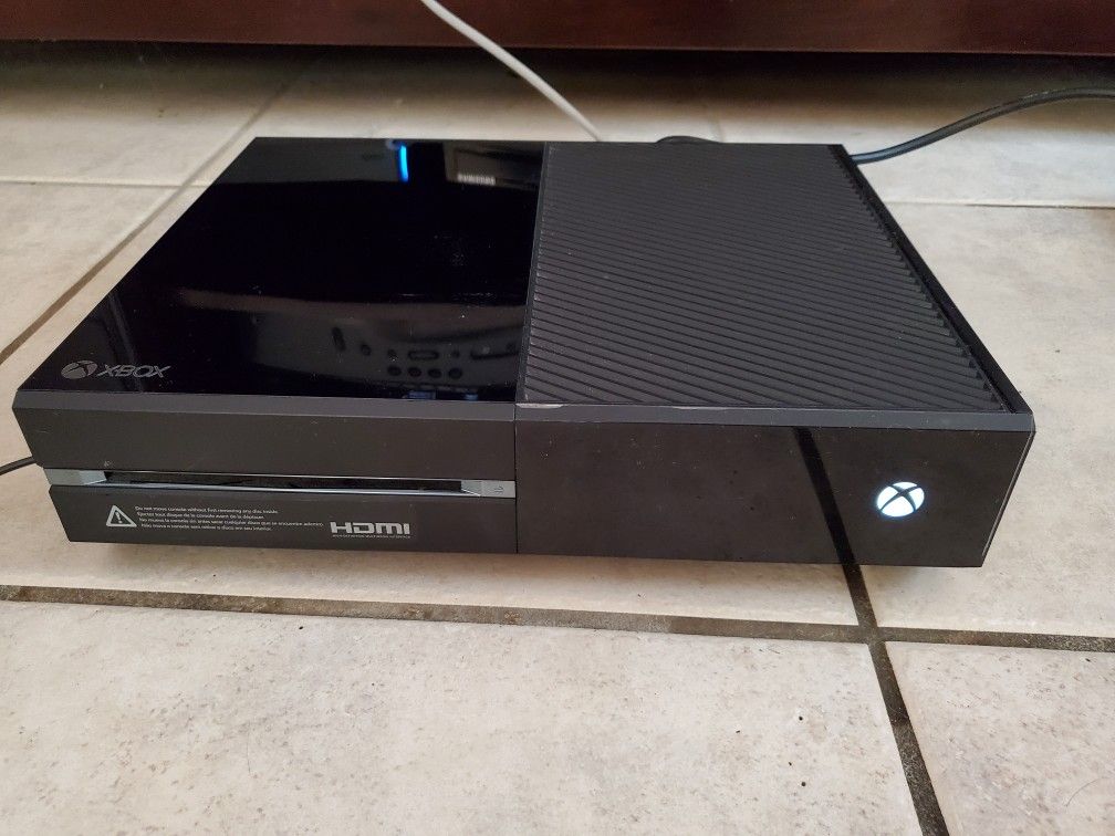 Xbox One with headphone and games