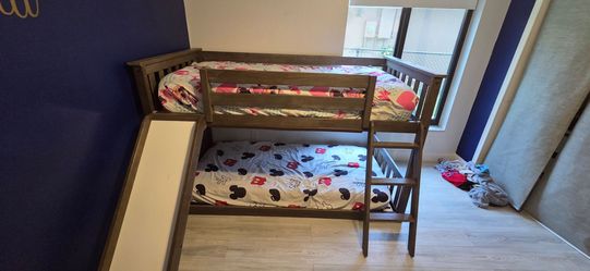 Twin bunkbed with slide. Comes when 1 twin mattress