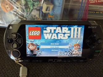 Sony psp and 15 games great condition asking $275