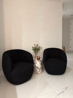 Black barrel CB2 chairs (2)