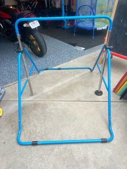 Gymnastics bar and mat