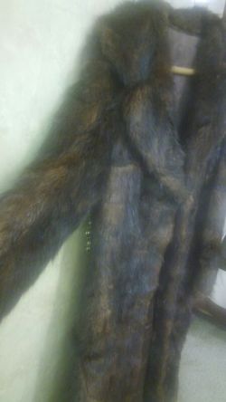 Woman long winter jacket good condition Moveing sale more please call (contact info hidden)